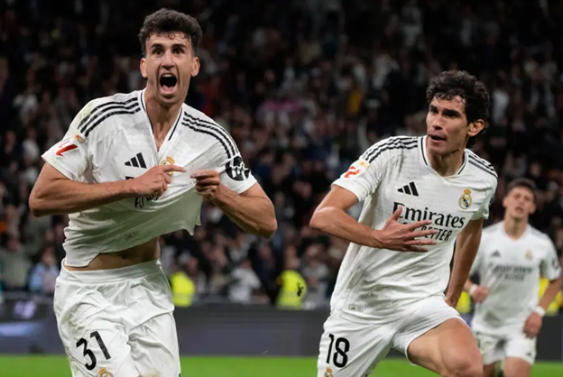 Real Madrid’s Jacobo Ramón passionately celebrates after scoring the winning goal against Mallorca.