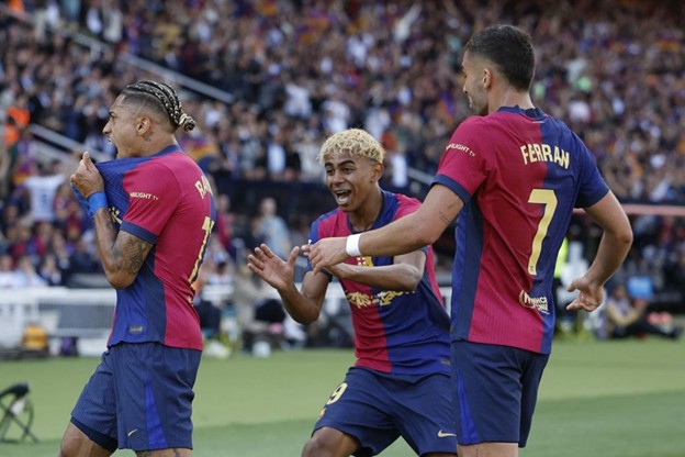 Barcelona players Raphinha, Lamine Yamal, and Ferran Torres