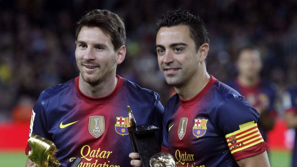 UFOOTBALL Xavi and Messi
