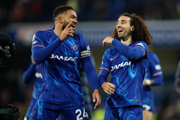 Reece James and Marc Cucurella celebrate Chelsea's victory.